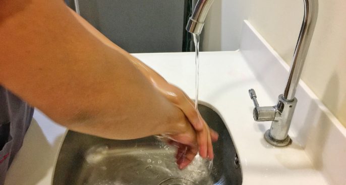 Washing hands in sink,Do Employers Have To Provide Running Water At Work